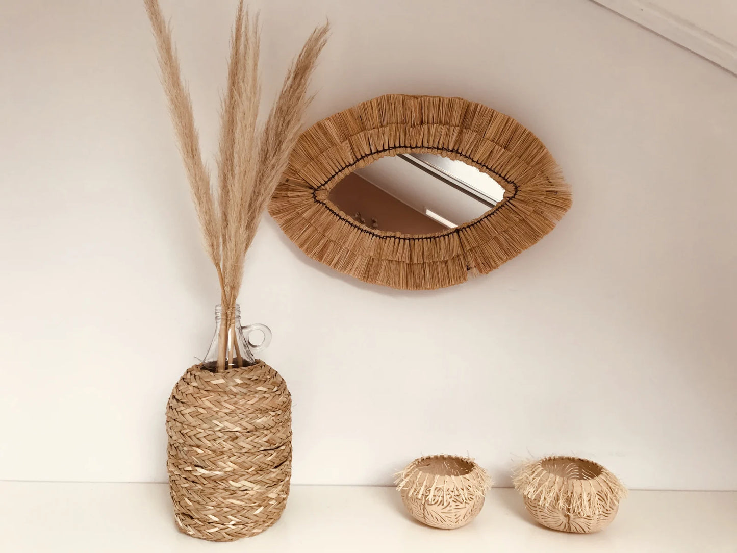 Glazen vaas met zeegras